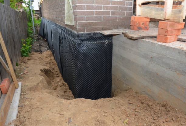 Happy homeowners after waterproofing job in Uniontown